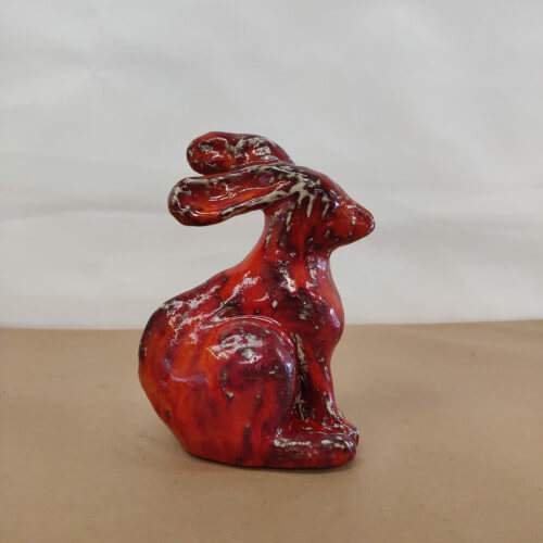 Hare figure in red glaze